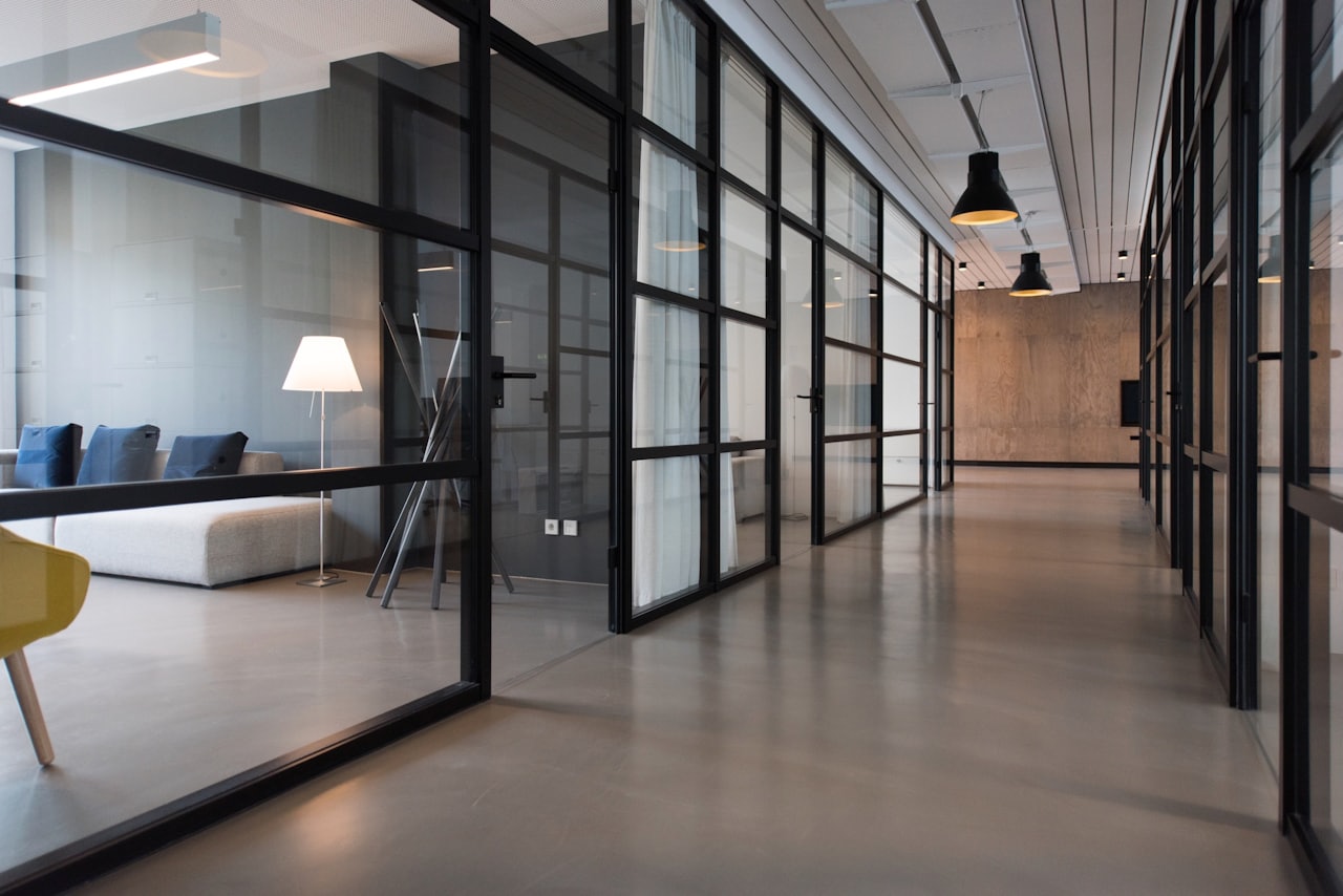 Modern team workspace with screens and strategy boards