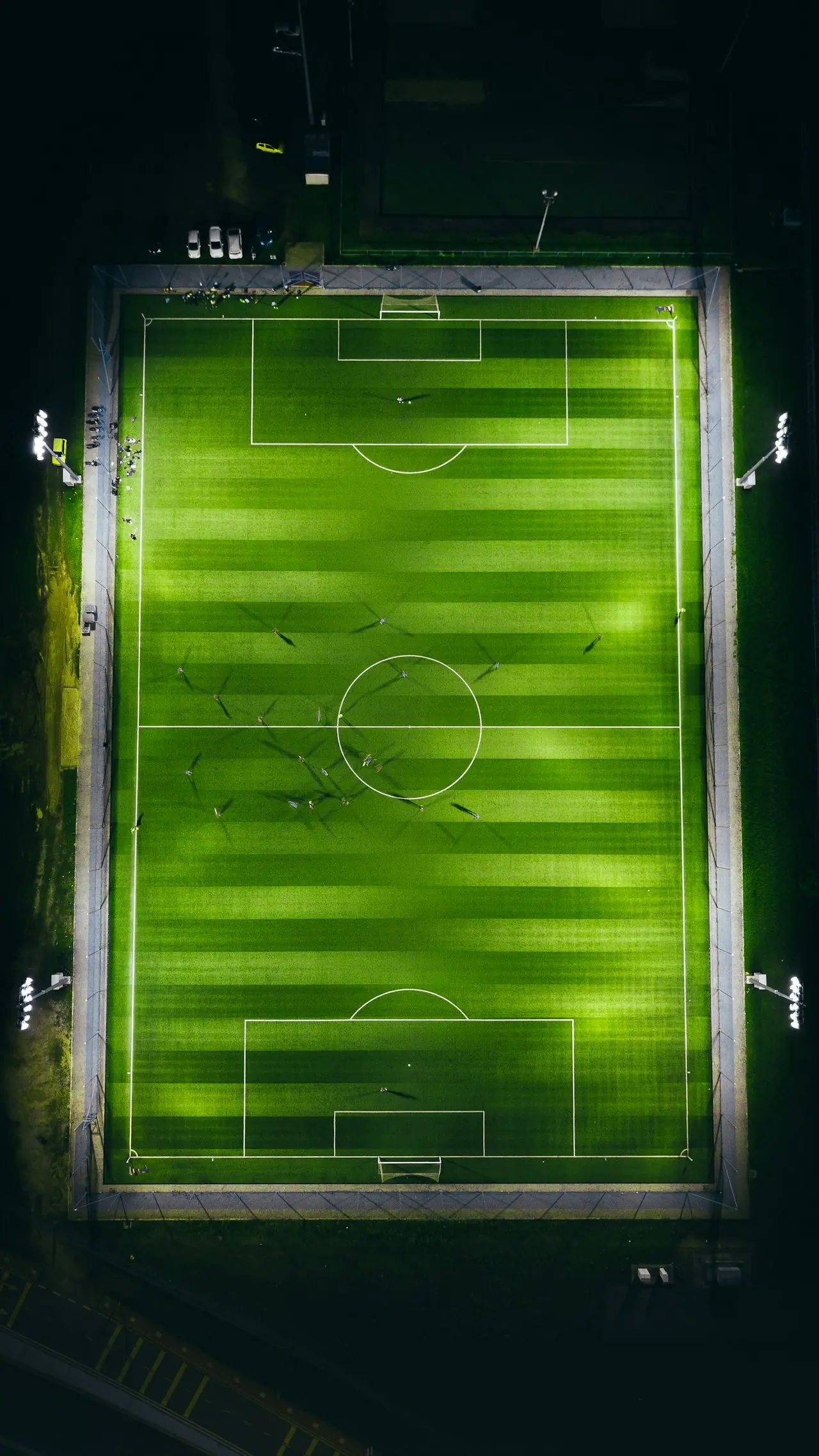 Football players training on a preseason pitch