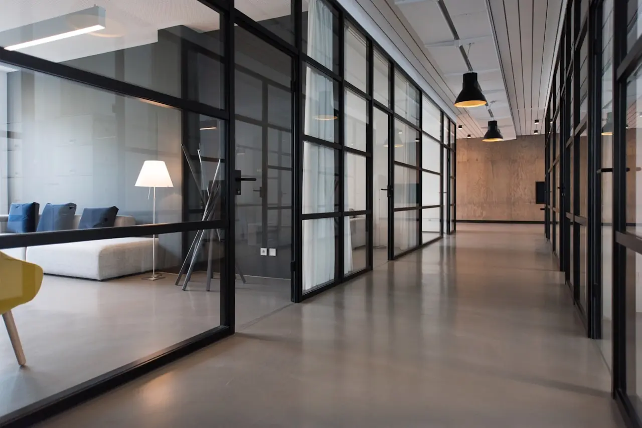 Modern team workspace with screens and strategy boards